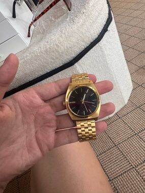 Nixon Gold-Tone Bracelet Watch with Black Dial Accent